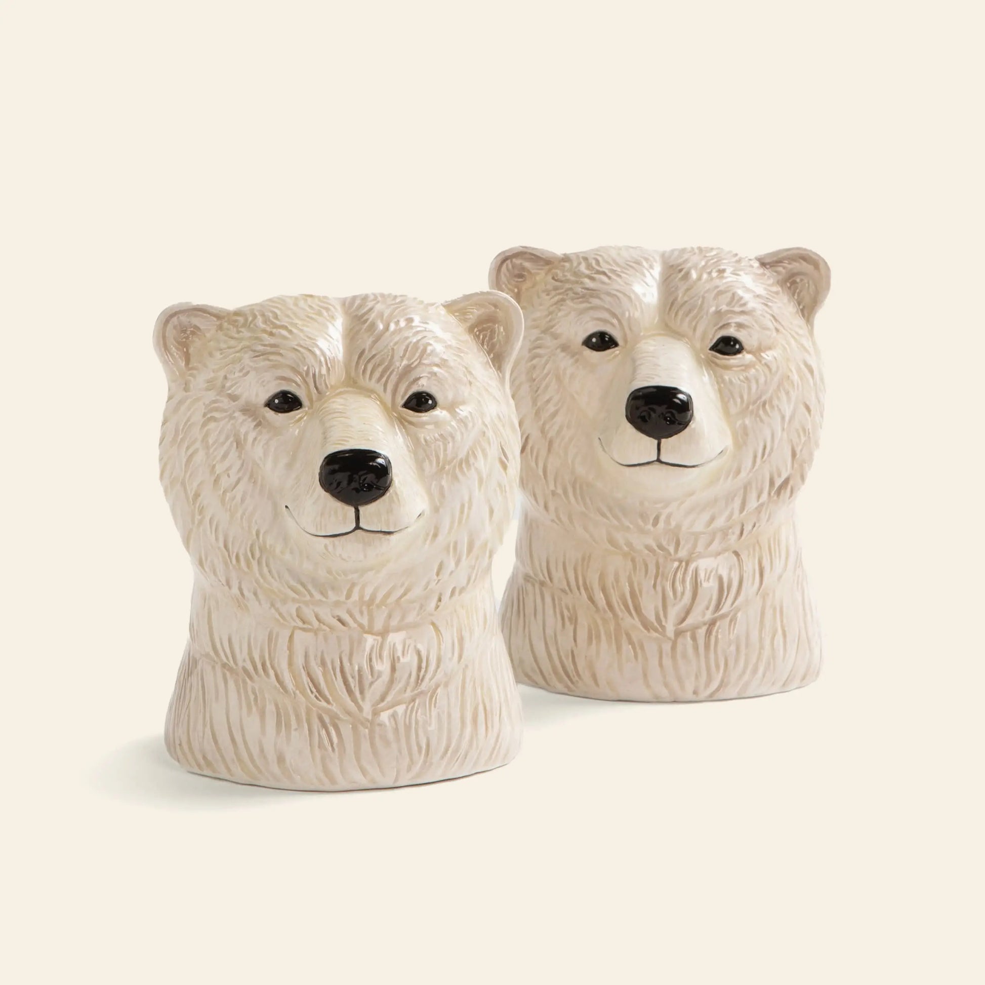 The &klevering Polar Bear Salt & Pepper Set by &klevering features two ceramic containers with textured fur and black noses, ideal for adding charm to your table setting. Perfect as a delightful addition to your dining decor.