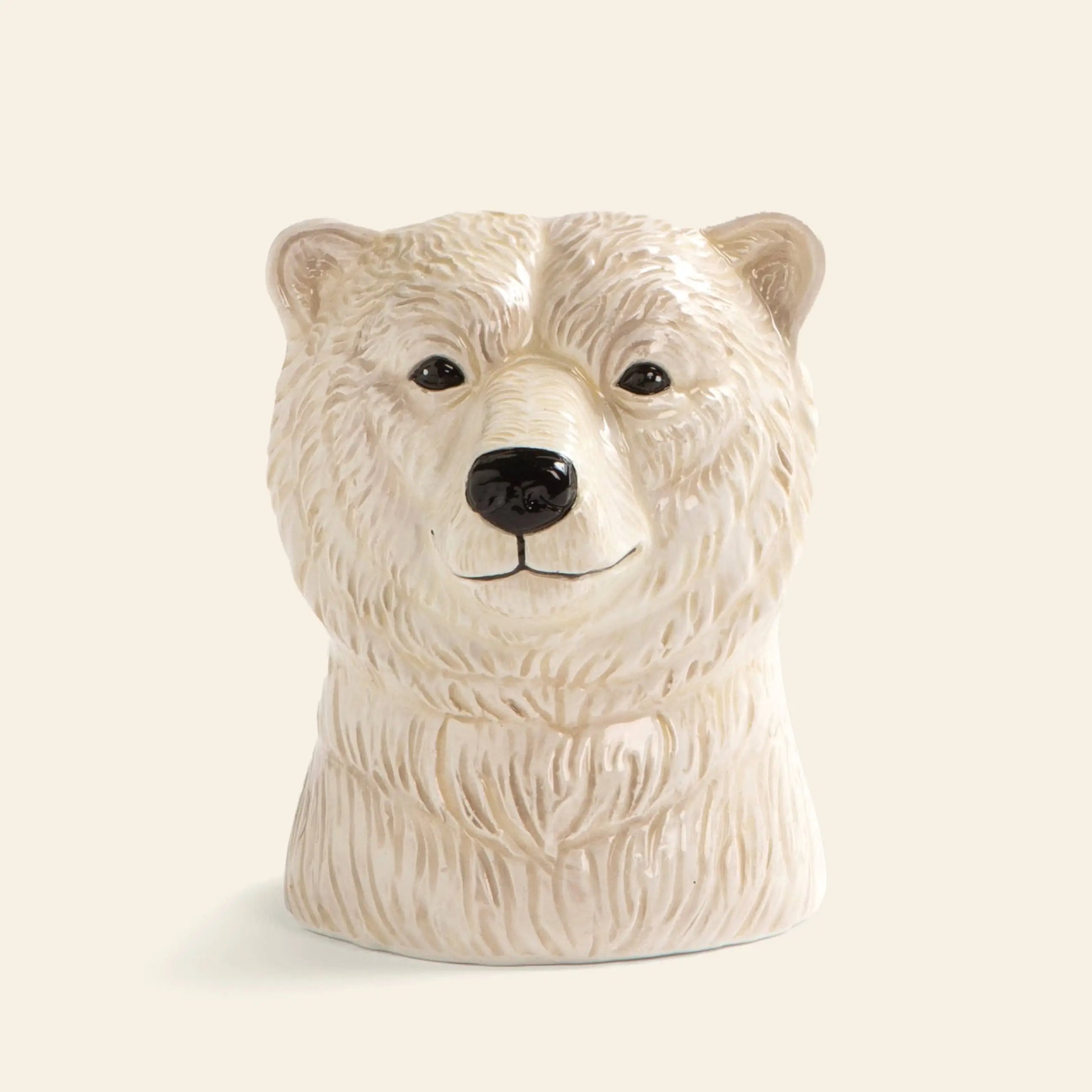 The &klevering Polar Bear Salt & Pepper Set by &klevering features ceramic containers shaped like polar bear heads with detailed fur texture and friendly expressions—perfect as unique table accents against a plain light background.