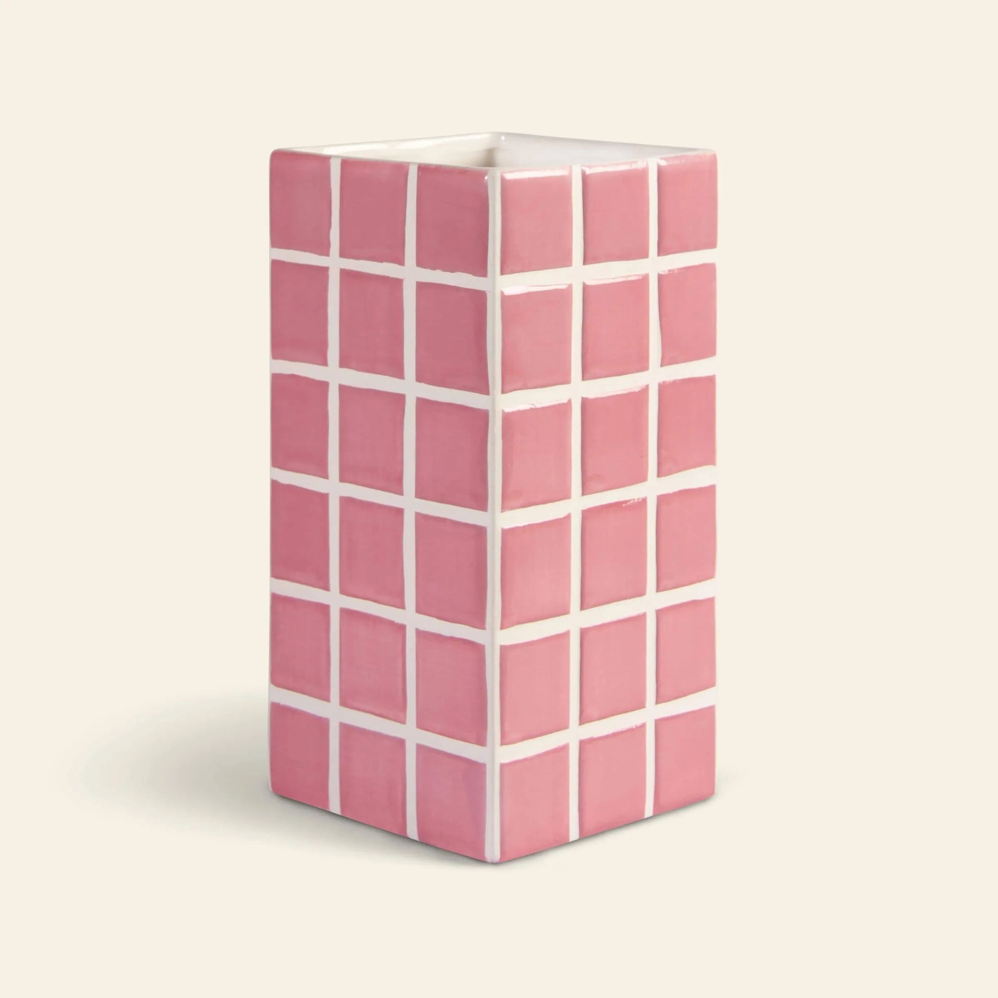 The &klevering Tiled Vase Pink by &klevering is a rectangular ceramic vase with a glossy candy-coloured pink and white tile pattern, featuring clean lines and set against a plain off-white background.