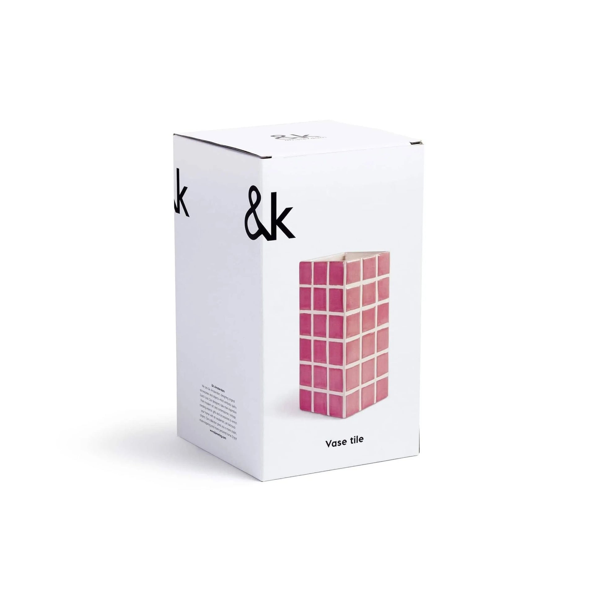 A white box with bold “&klevering” branding displays the &klevering Tiled Vase Pink—an eye-catching pink vase with a candy-coloured tile pattern, perfect for showcasing blooms. Vase tile text appears below the image on the front.