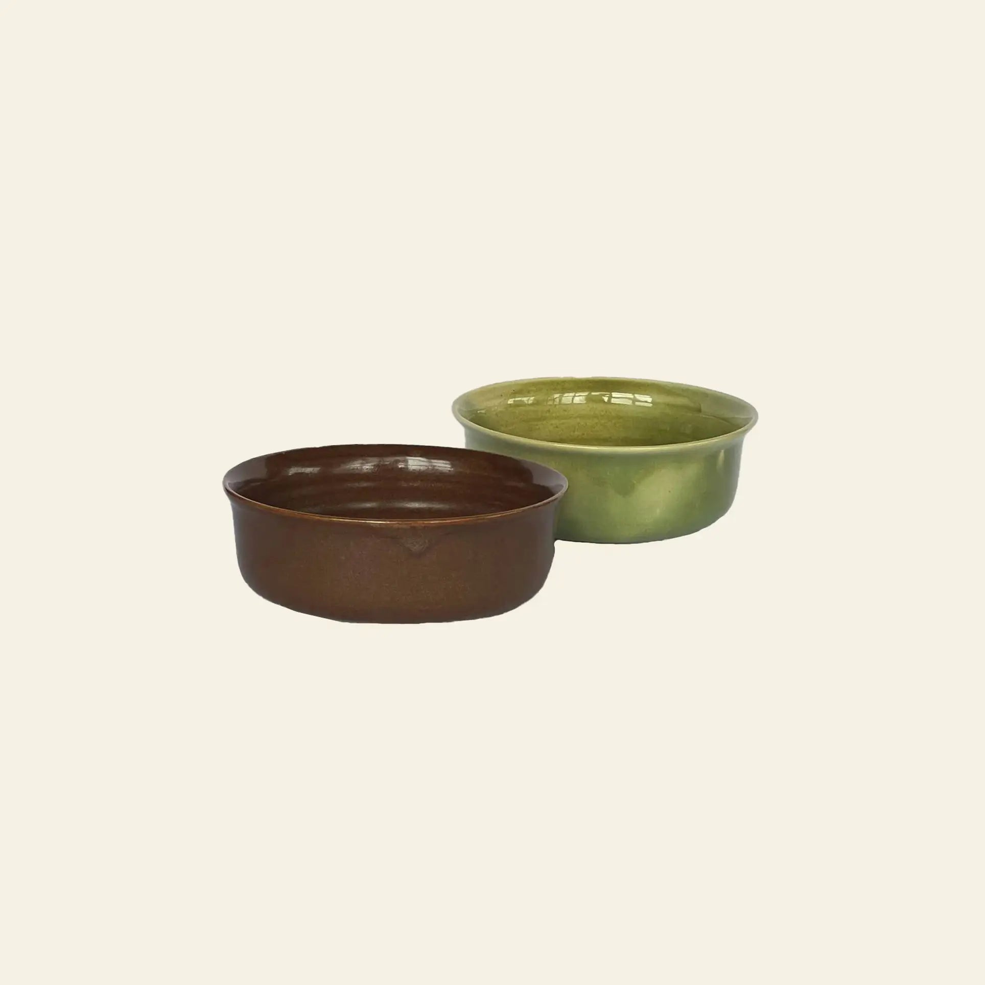 The ves Aki Bowl, Set of 2 by ves features elegant handcrafted brown and green bowls, side by side on a light background, highlighting refined East Asian tableware.