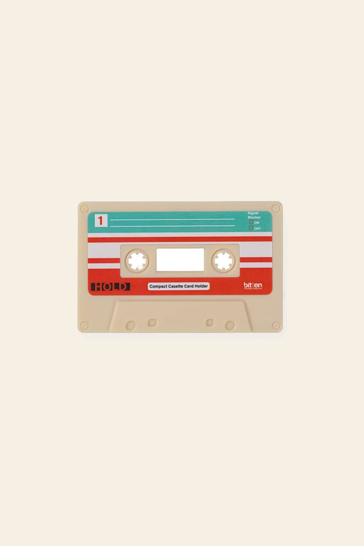 The Bitten Cassette Card Holder by Bitten features a retro cream cassette design with red, white, and teal accents, two visible reels, a blank label area, and built-in RFID protection against fraud.