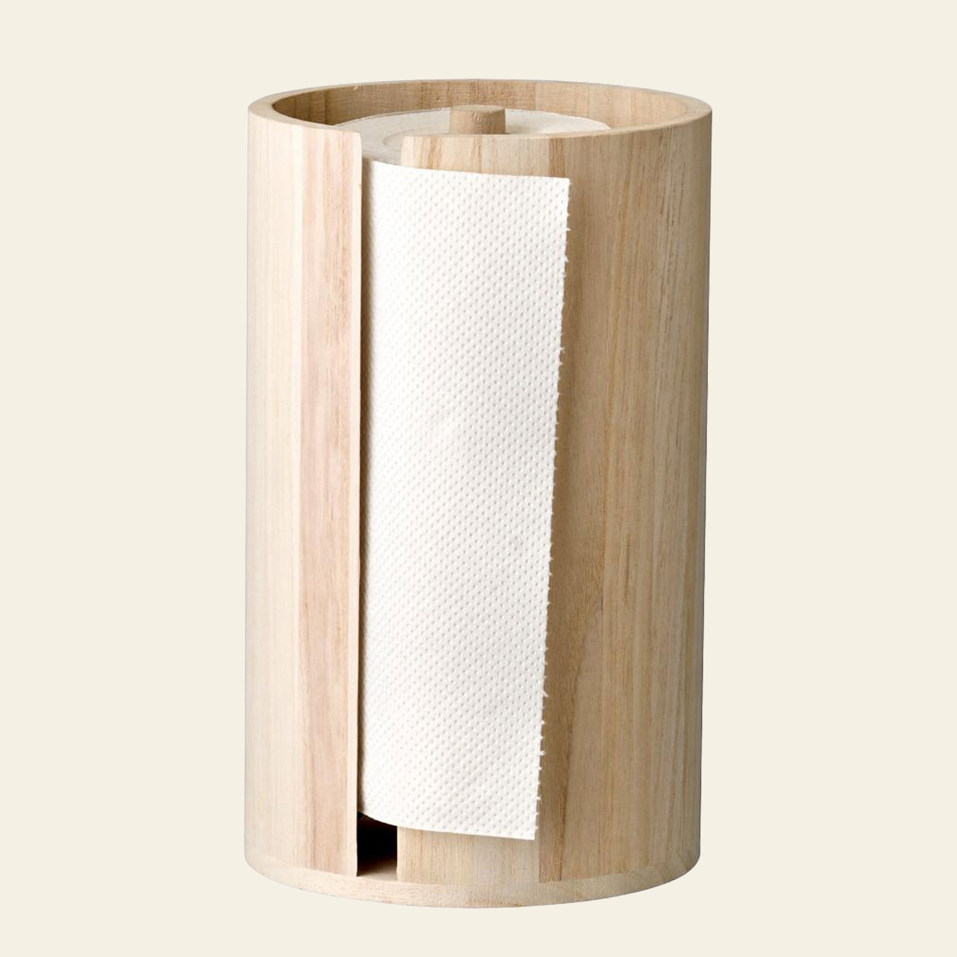 The Bloomingville Celian Kitchen Paper Stand is a cylindrical, smooth, light wood paper towel holder with a vertical slot revealing the roll inside.