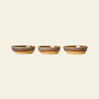 The HKliving 70s Ceramics: Pasta Bowls, Set of 2 features glossy, earth-toned glazes in brown, orange, and green stripes for a retro touch—perfect vintage-inspired tableware to elevate any setting.