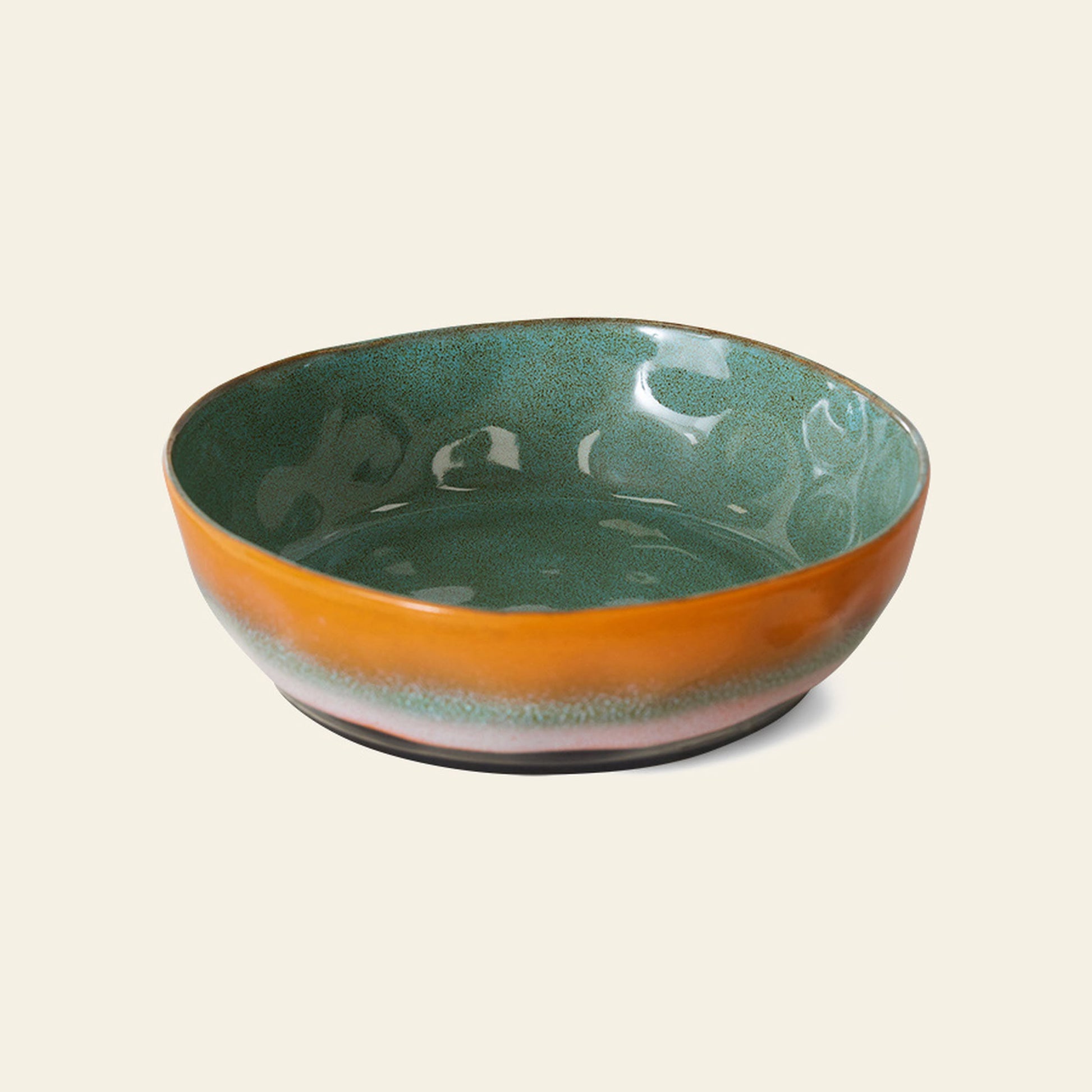The HKliving 70s Ceramics Pasta Bowls (Set of 2) feature a glossy green interior and smooth orange-brown exterior, offering a retro-inspired tableware option for fans of vintage style.