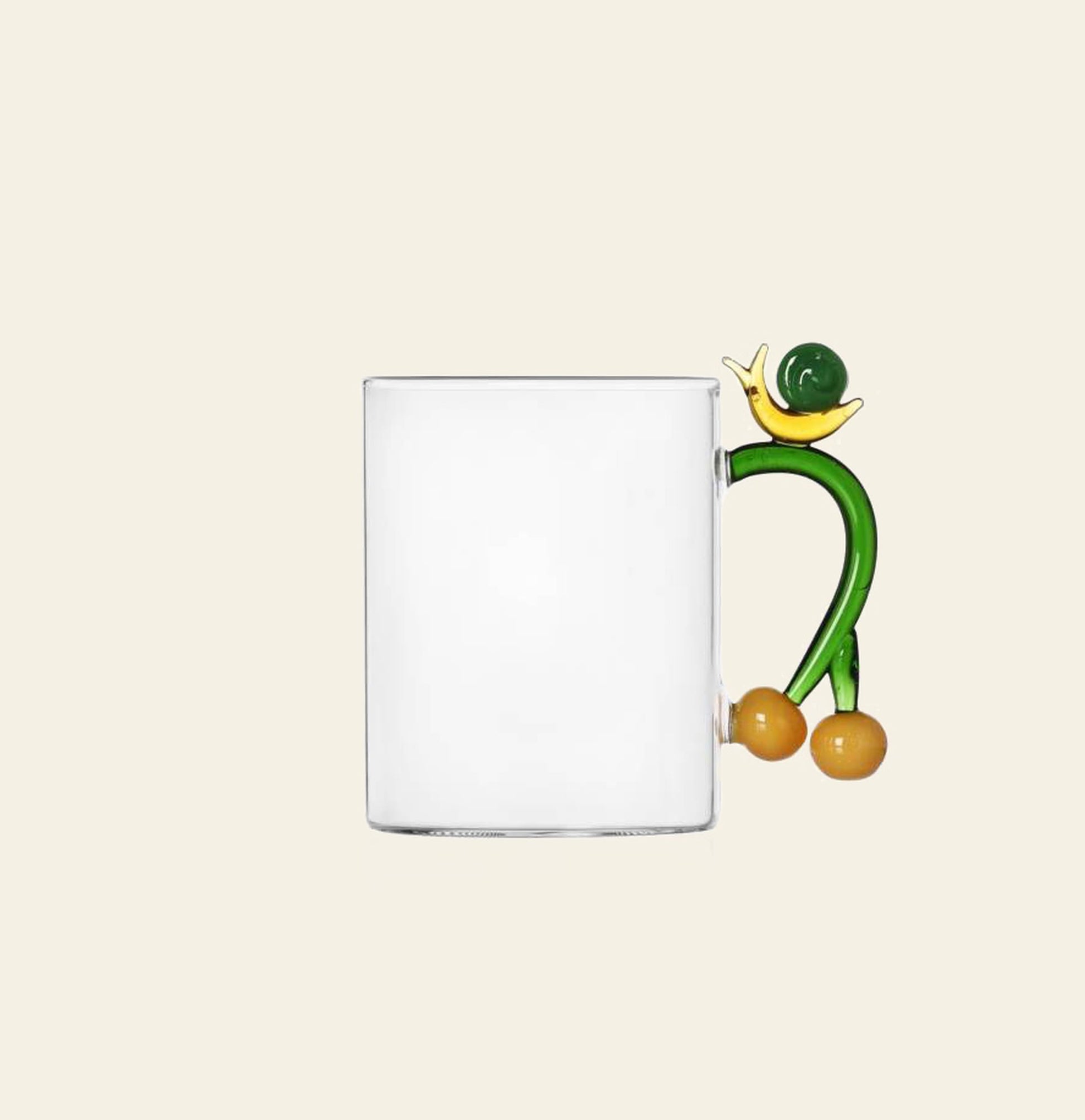 The Ichendorf Milano Fruits and Flower Mug features a playful abstract handle with yellow and green accents—an eye-catching clear glass design by Ichendorf Milano, perfect for any fruit and flower mug collection.