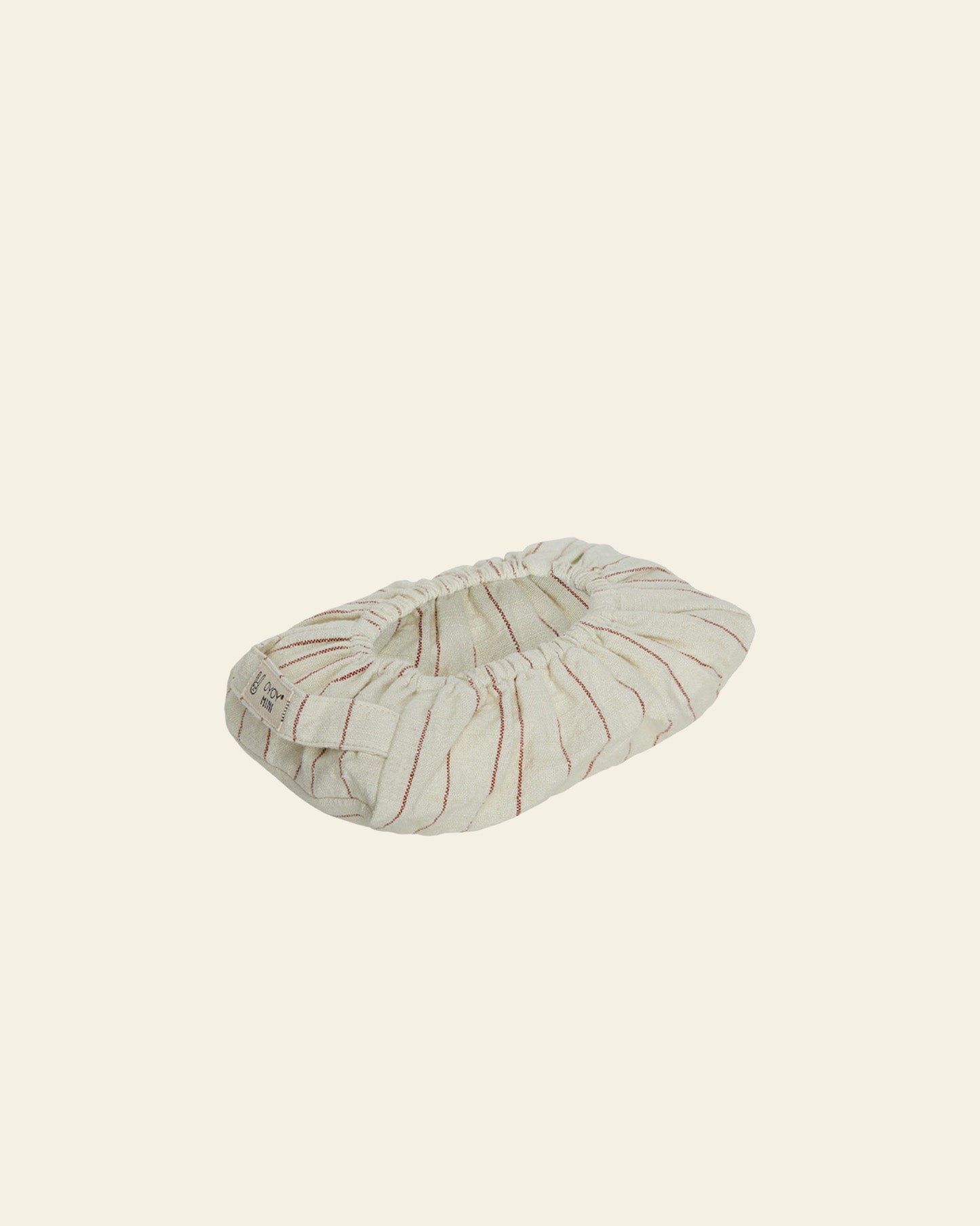 The OYOY Living Design Wet Wipes Cover in Nutmeg features subtle red stripes and gathered elastic edges, shown against a plain cream background.