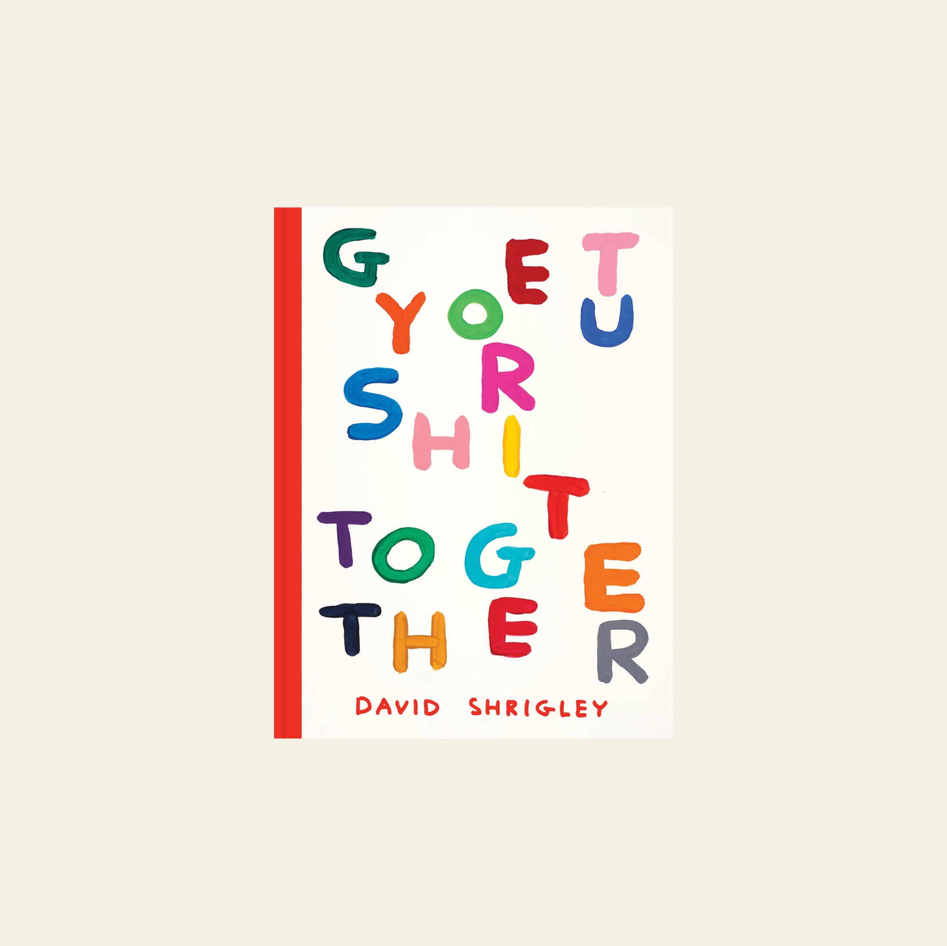 The Shrig Shop David Shrigley - Get Your Shit Together book features a cover with colorful, scattered letters spelling the title, David Shrigley's name in red at the bottom, and a red vertical stripe along the left edge. Brand: Shrig Shop.