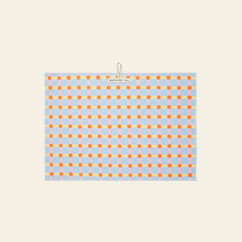 The WARMGREY TAIL Dot Check Kitchen Cloth 2 is a rectangular tea towel with orange and red dots connected by blue lines on a light background, featuring a handy top-center loop and label for easy hanging.