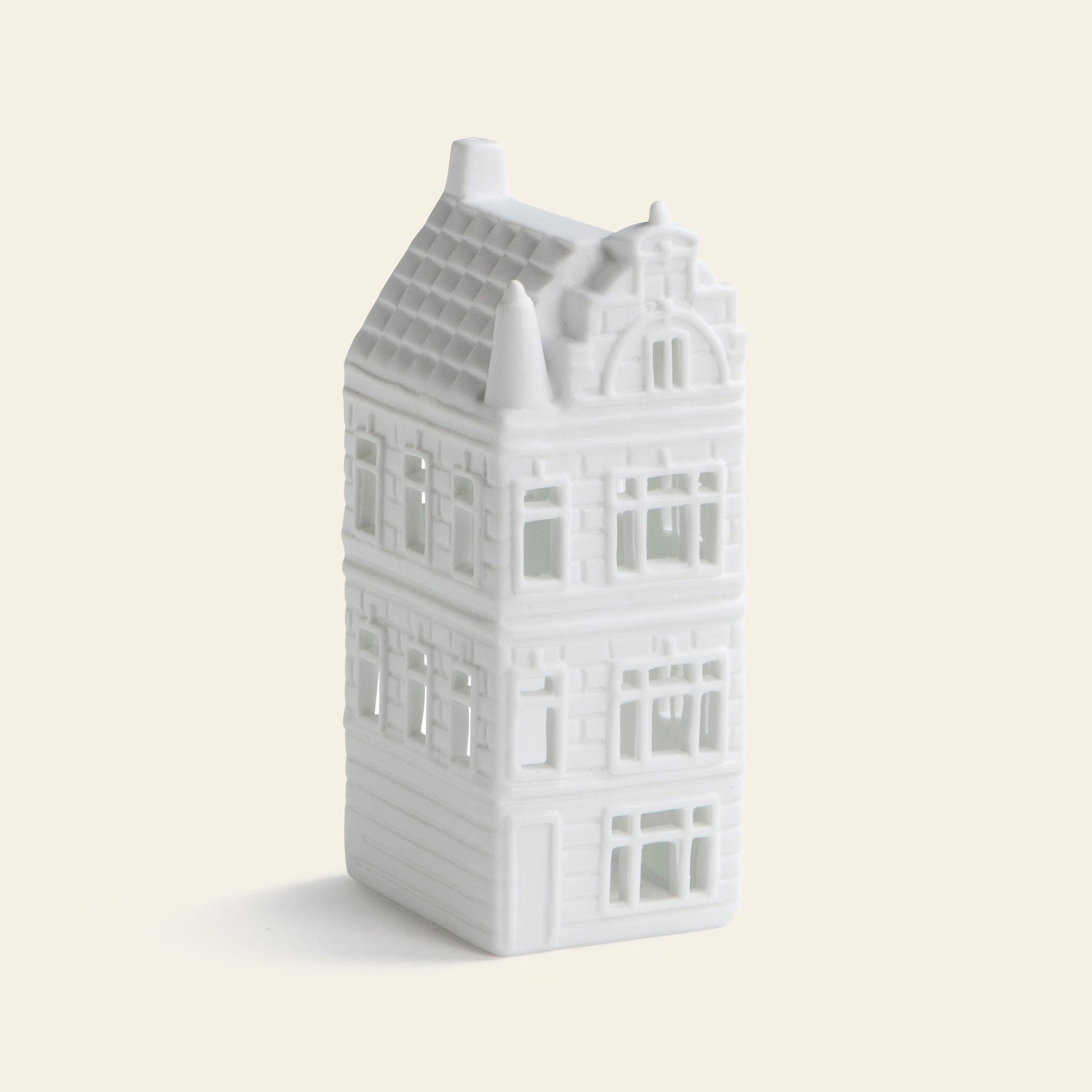 The &klevering Canal House #4 Tealight, Set of 3 by &klevering features small white ceramic European-style townhouses, perfect for Amsterdam-inspired home décor and ideal as charming canal house tealight holders.
